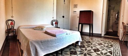 Aghinas Hotel Bosa Bagian luar foto