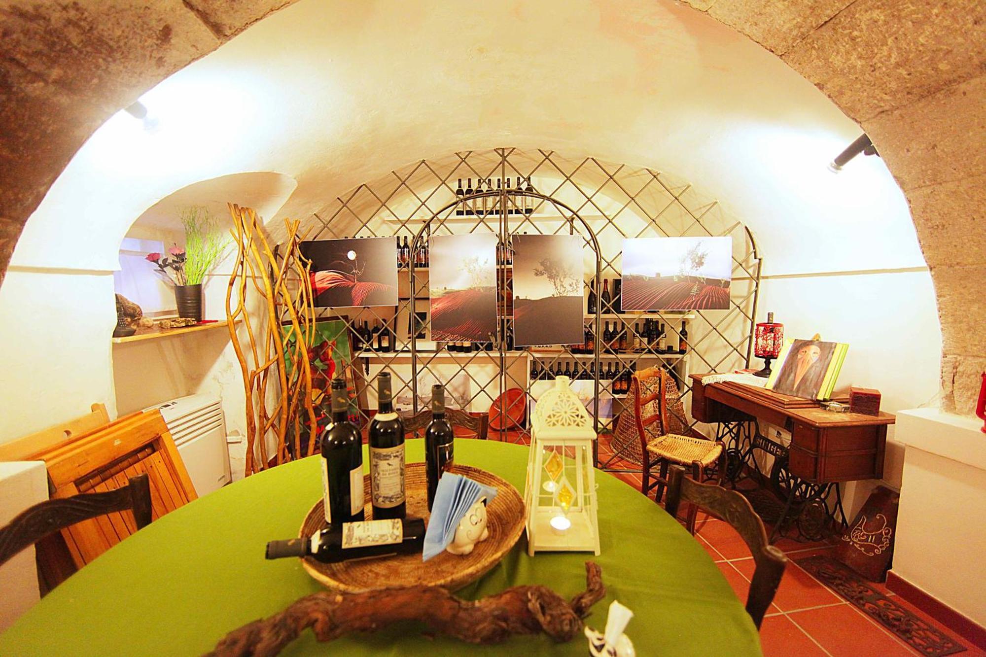 Aghinas Hotel Bosa Bagian luar foto