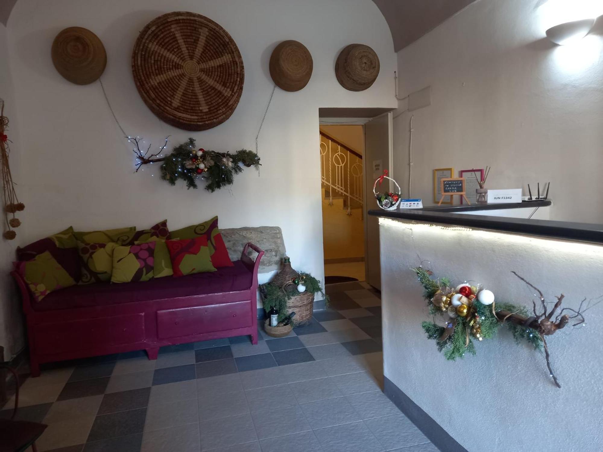 Aghinas Hotel Bosa Bagian luar foto